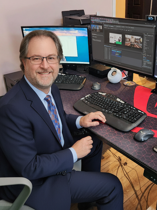 Steven Schain at his desk